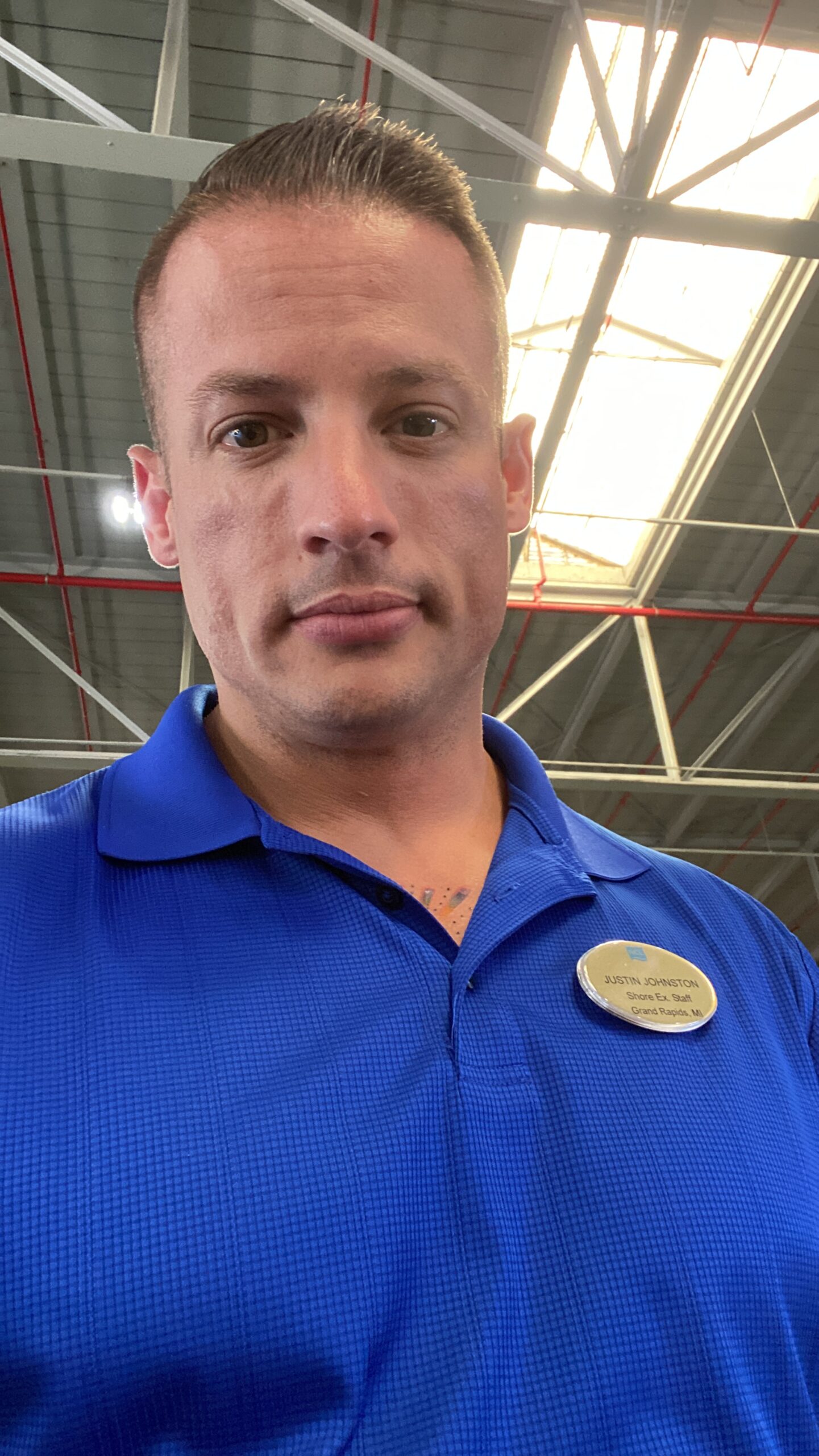 Justin Johnston from Best Helicopter Tours managing tours on the pier on The Pride of America Cruise