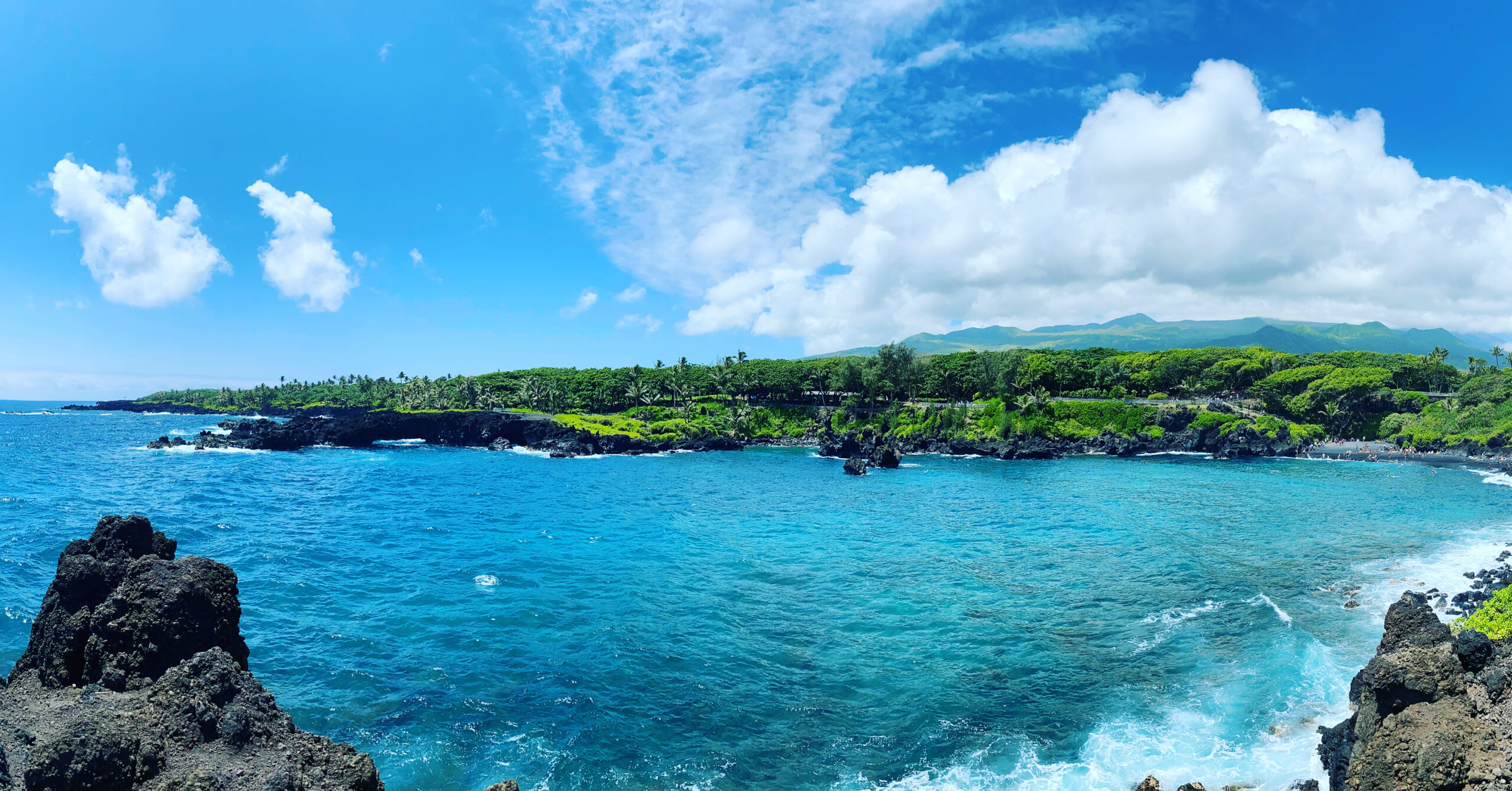 Justin Johnston from Best Helicopter Tours in Maui at a Black sand beach at the end of road to hana 14