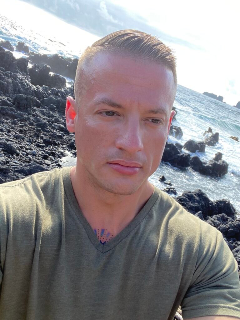 Justin Johnston from Best Helicopter Tours in Maui at a Black sand beach at the end of road to hana 3