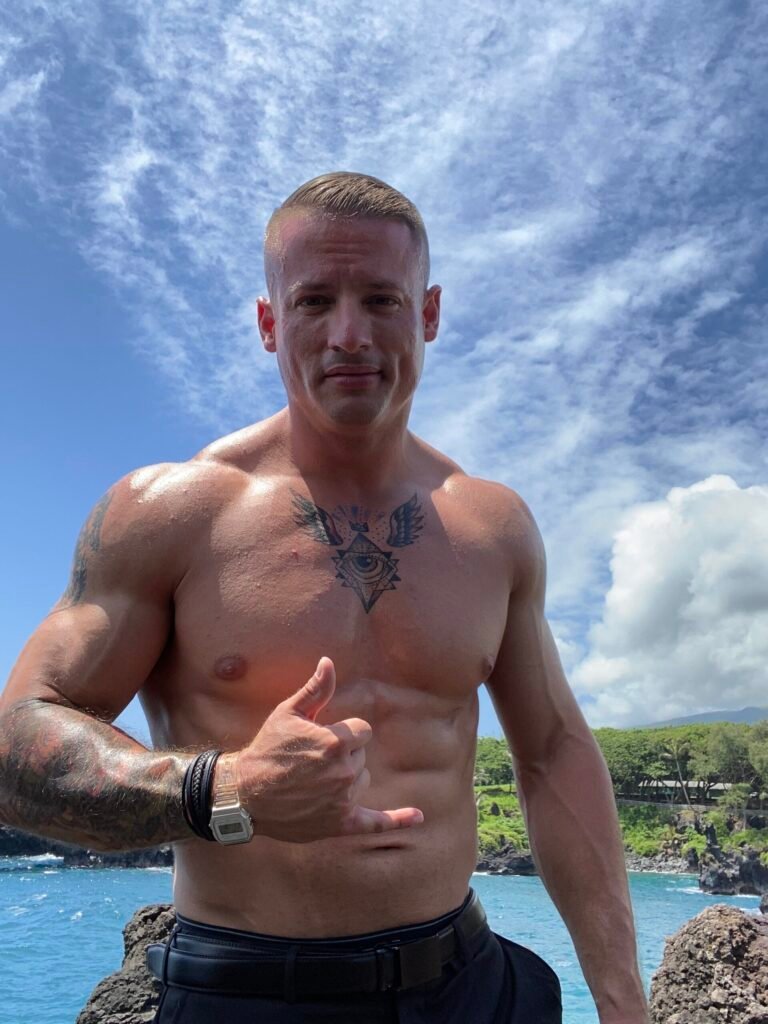 Justin Johnston from Best Helicopter Tours in Maui at a Black sand beach at the end of road to hana 11