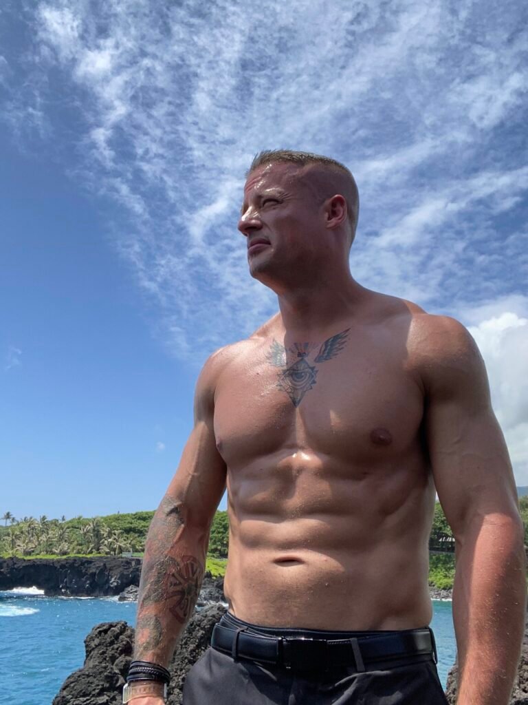 Justin Johnston from Best Helicopter Tours in Maui at a Black sand beach at the end of road to hana 12