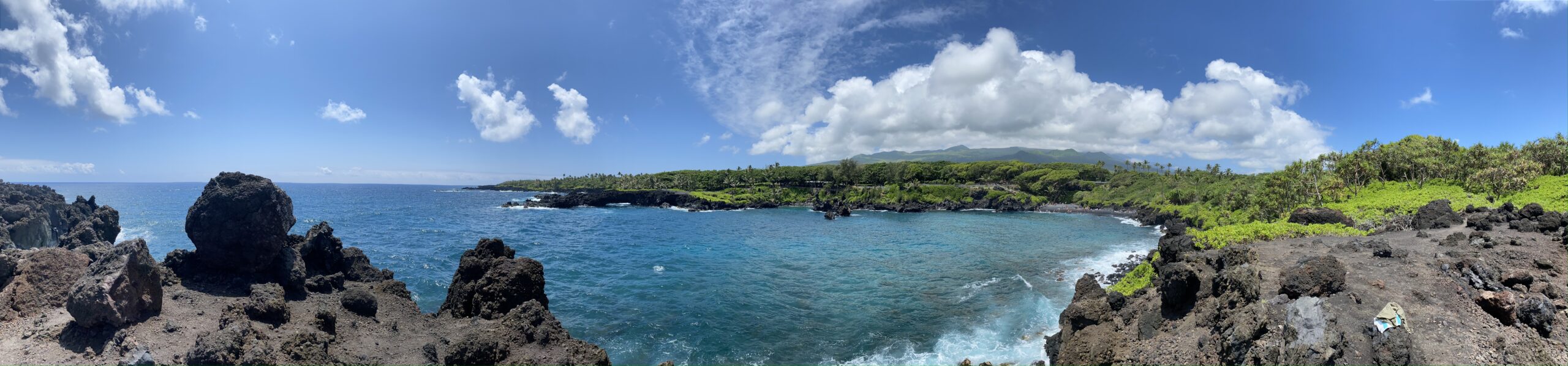 Justin Johnston from Best Helicopter Tours in Maui at a Black sand beach at the end of road to hana 13