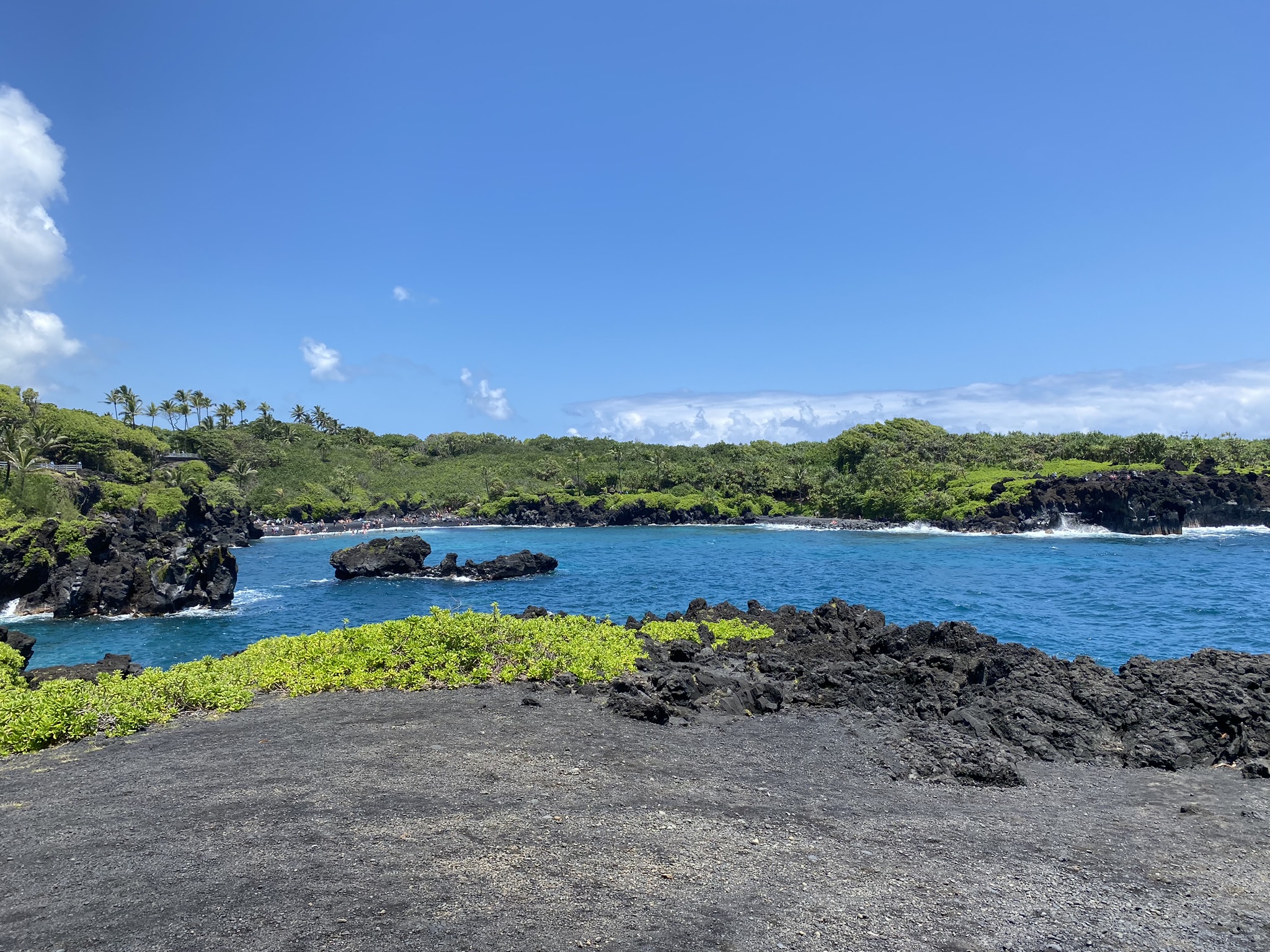 Justin Johnston from Best Helicopter Tours in Maui at a Black sand beach at the end of road to hana 17