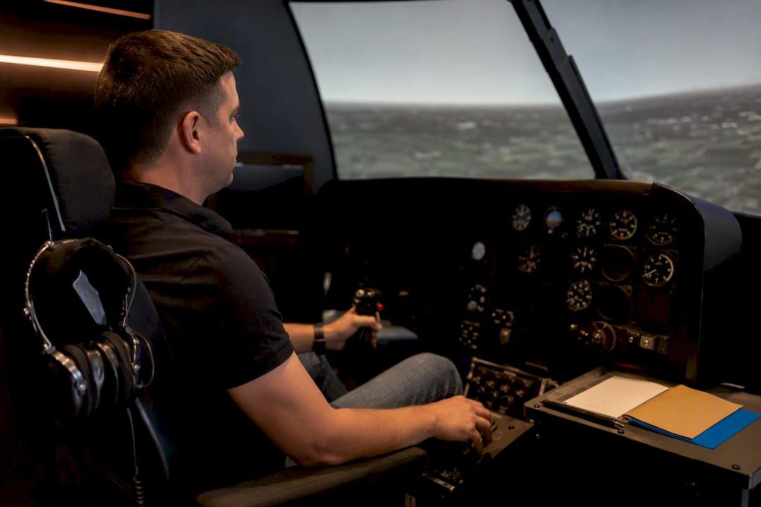 Pilot performing helicopter simulator training