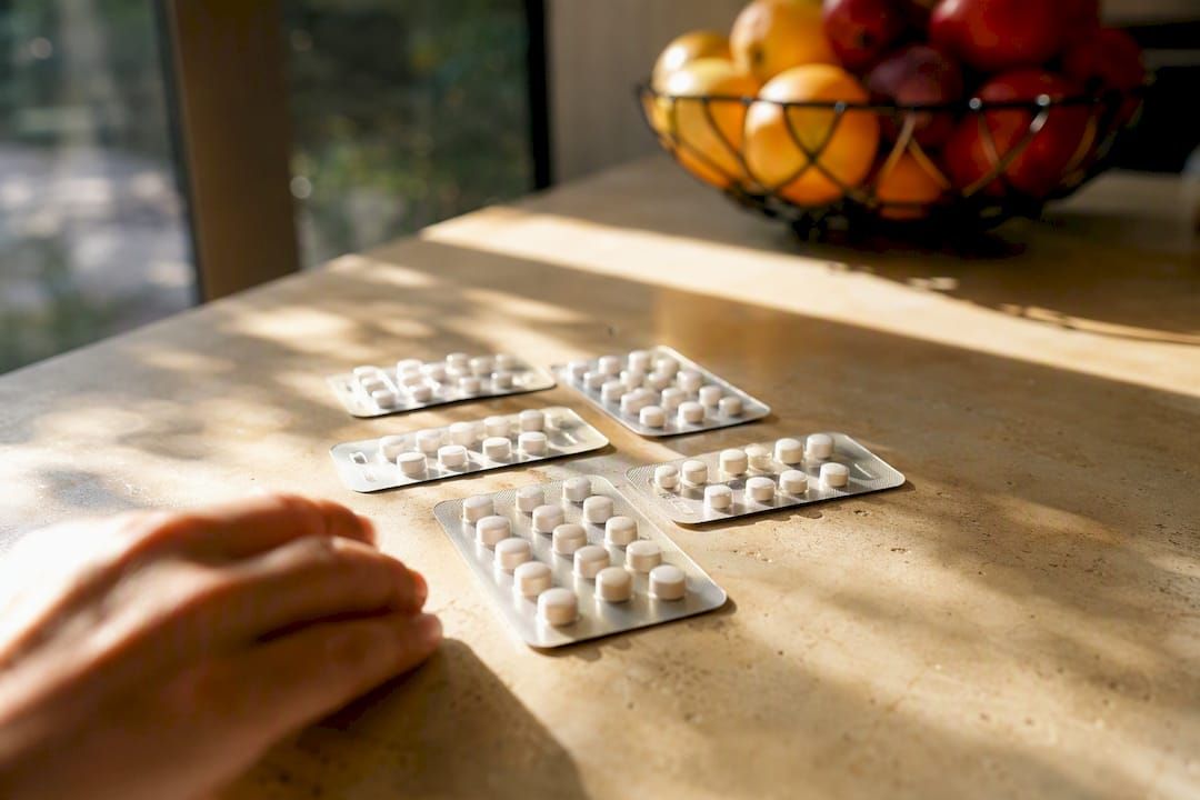Antihistamine pills for motion sickness on table