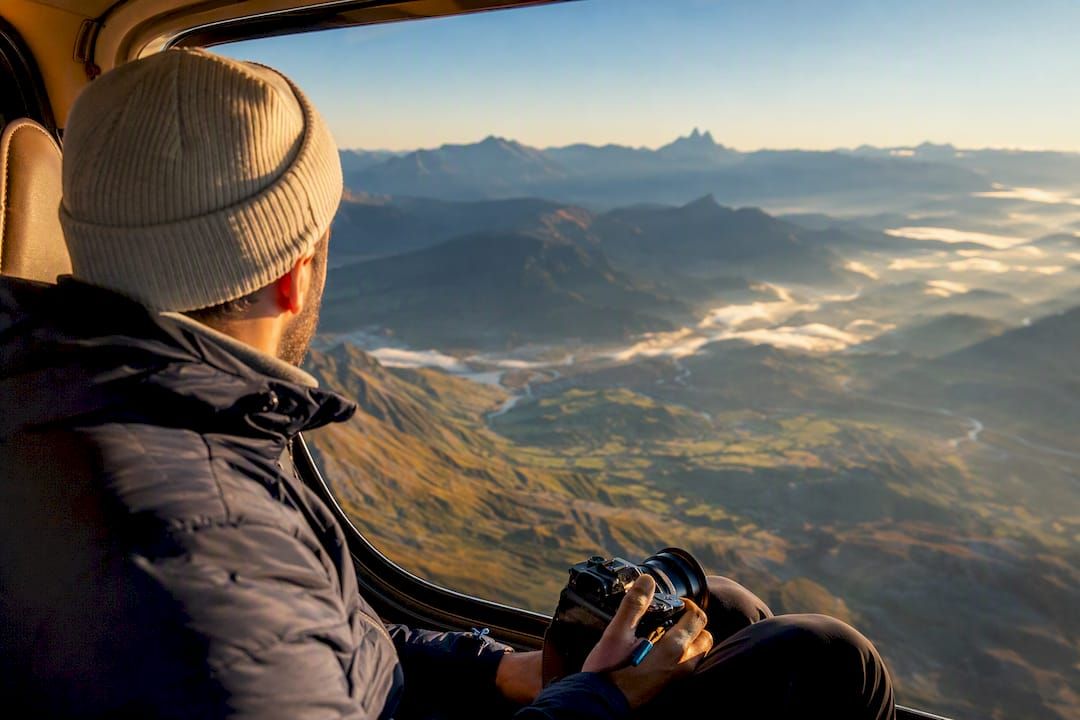 Traveler viewing clear sunrise valley from tour