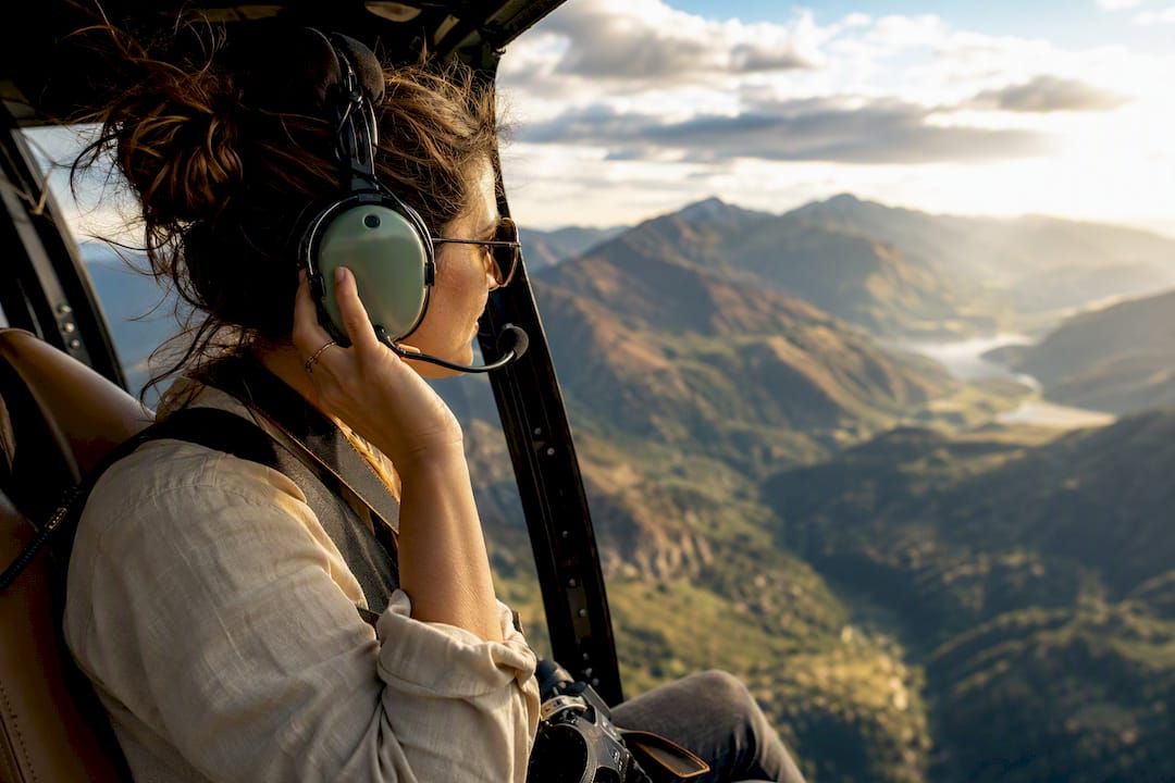 Traveler using headset on open-air tour