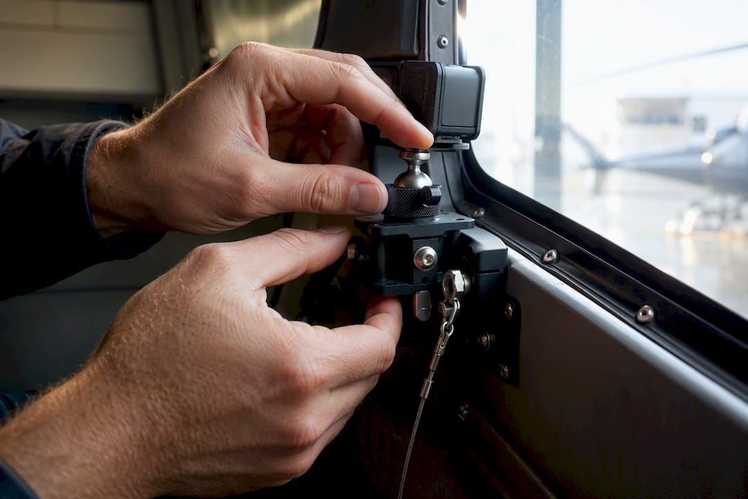 Vibration-damping helicopter camera mount hardware