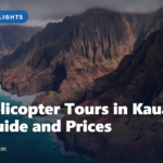 Aerial view of the rugged Na Pali Coast cliffs on Kauai, a highlight of the best helicopter tours in Kauai