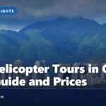 Aerial view of Honolulu's skyline and green mountains, a highlight of the best helicopter tours in Oahu